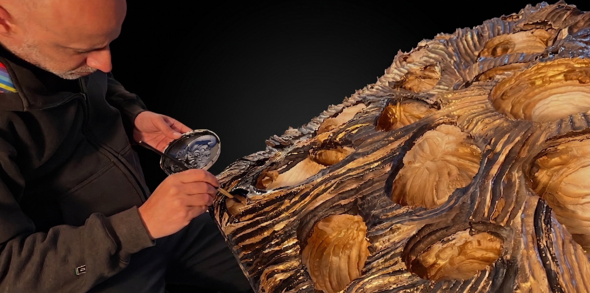 George El Khoury working on a sculptural relief